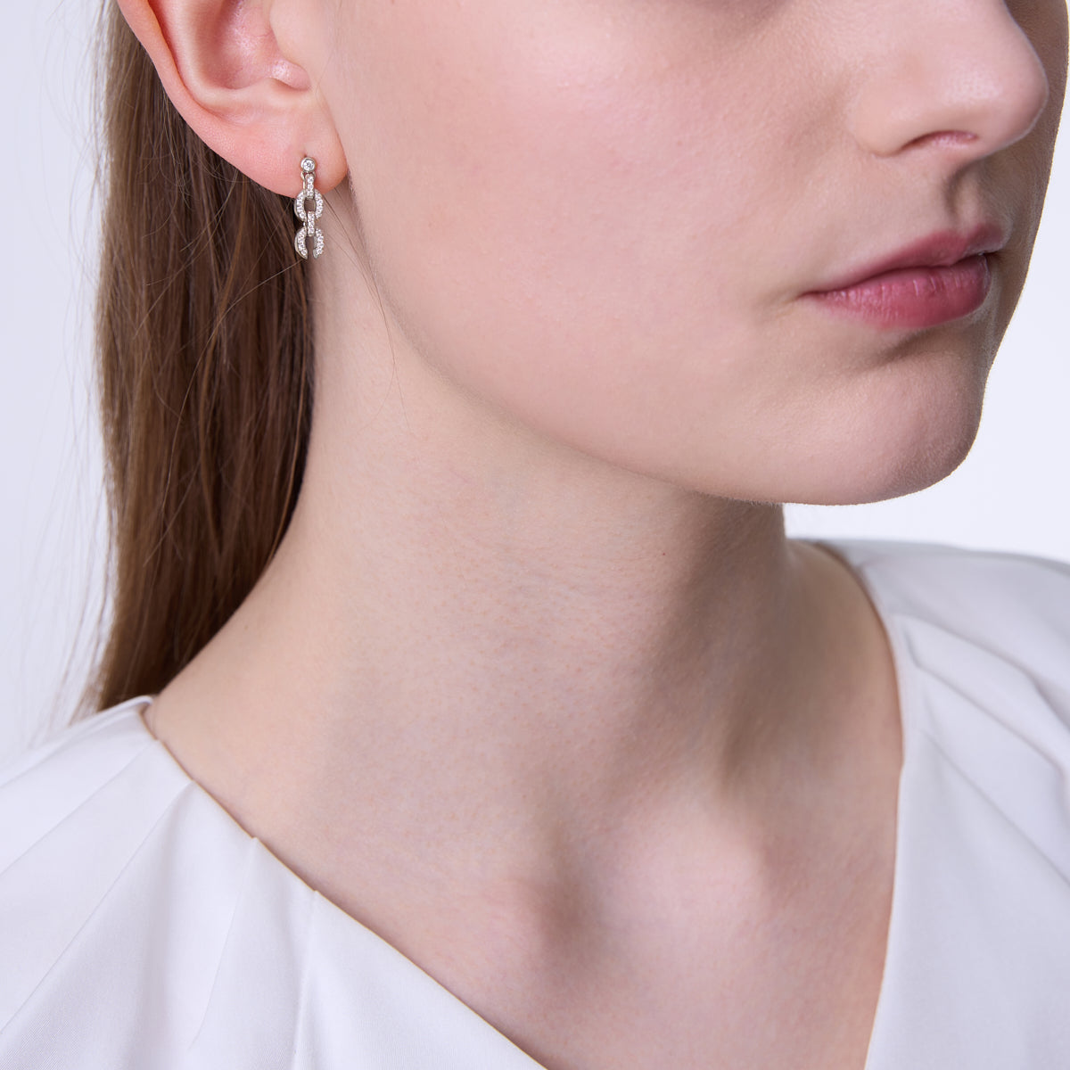 Links Small HC Logo Earring (white gold with melee diamonds)